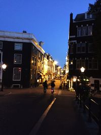 View of road along buildings