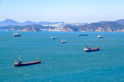 Boats sailing in sea