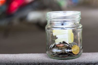 Close-up of drink in glass jar on table