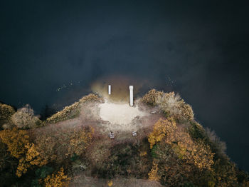 Aerial view of sea against landscape