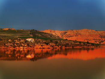 Reflection of mountain in water