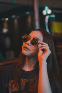 Portrait of woman holding ice cream