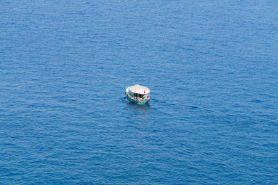 Boat sailing in sea