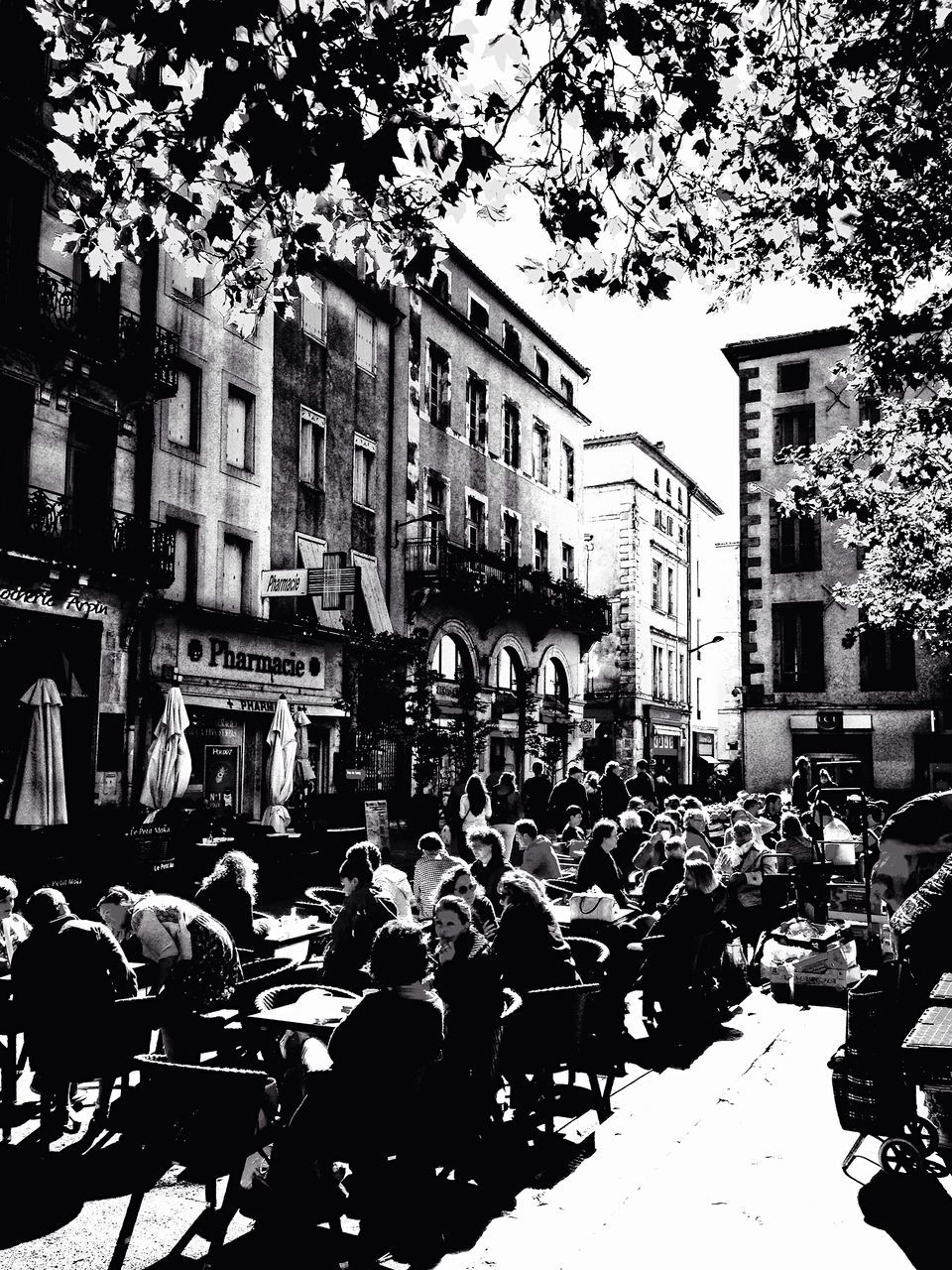 building exterior, architecture, large group of people, built structure, street, city, outdoors, real people, crowd, men, city life, day, road, tree, women, group of people, sky, people