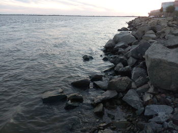 Scenic view of sea against sky during sunset