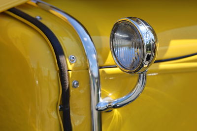 Close-up of yellow vintage car