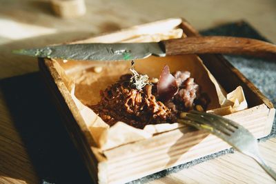 High angle view of bread on cutting board