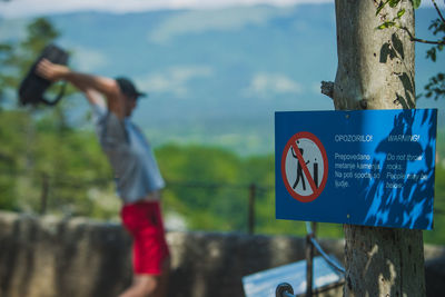 Information sign on wooden post