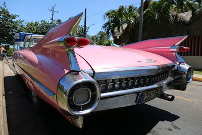 Close-up of car against sky