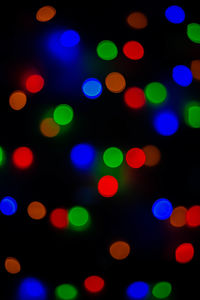 Defocused image of illuminated lights at night