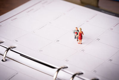 High angle view of people relaxing on paper