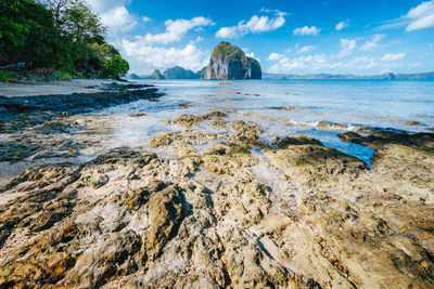 Scenic view of beach against sky