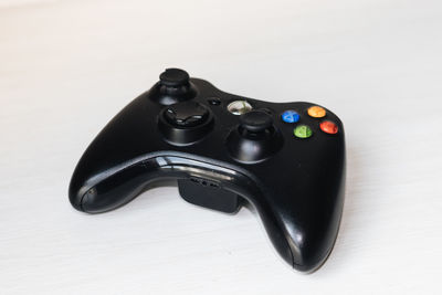 High angle view of black coffee on table against white background