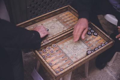 Playing board games in an alley in the old city of jerusalem, israel