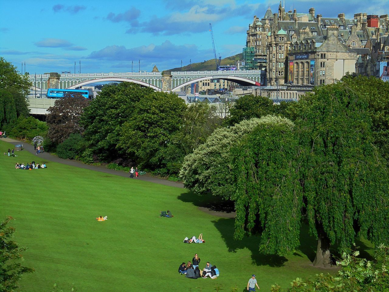 PANORAMIC VIEW OF PEOPLE IN PARK