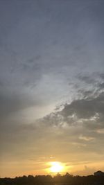 Low angle view of dramatic sky during sunset