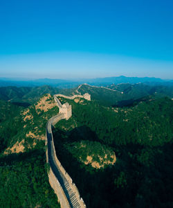 Scenic view of landscape against blue sky