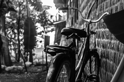 Bicycle parked against blurred background