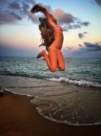 Scenic view of sea at sunset