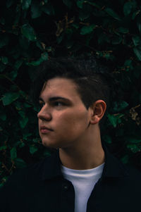 Portrait of young man looking away