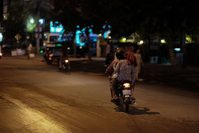 Rear view of motorbike on street