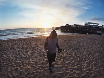 Scenic view of beach at sunset