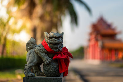 Close-up of statue against temple