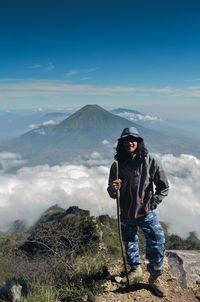 Full length of man against mountains against sky