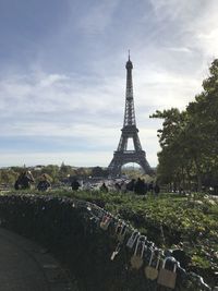 View of tower against cloudy sky