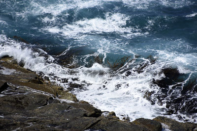 Scenic view of rocks in sea