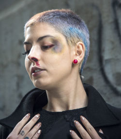 Close-up of young woman looking away