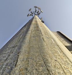 High section of built structure against clear sky