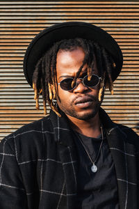 Portrait of young man wearing sunglasses