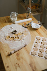 Young woman making christmas cookies