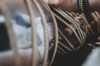 Close-up of man holding cigarette