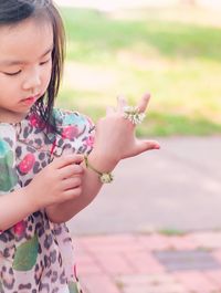 Close-up of girl holding crab