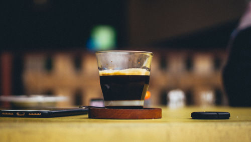 Close-up of coffee served on table