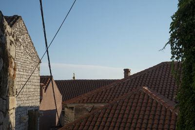 Houses against sky in town