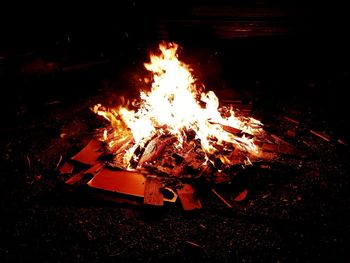 Bonfire on field at night