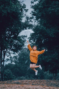 Man jumping in rain