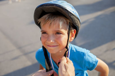 Portrait of young woman standing outdoors