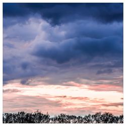 Scenic view of dramatic sky during sunset