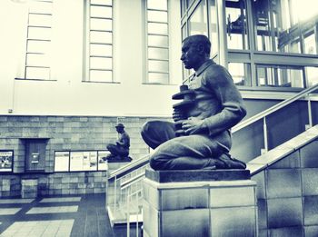 Man sitting by window