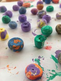 High angle view of multi colored candies on table