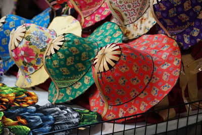 Close-up of hats for sale in market