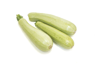 Close-up of squashes against white background
