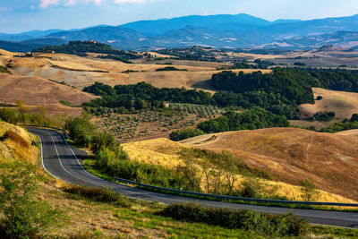 High angle view of road amidst landscape against sky