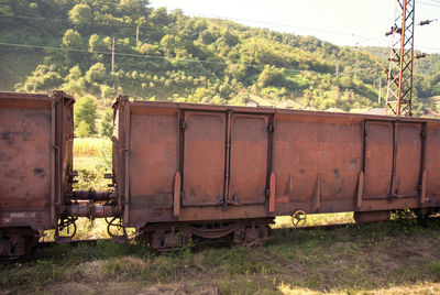 Train on railroad track amidst field