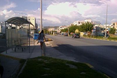 Woman standing on road