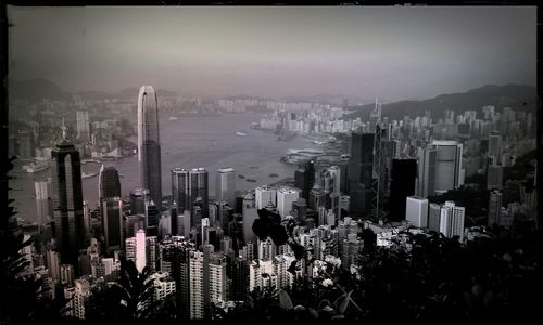 Buildings in city against sky